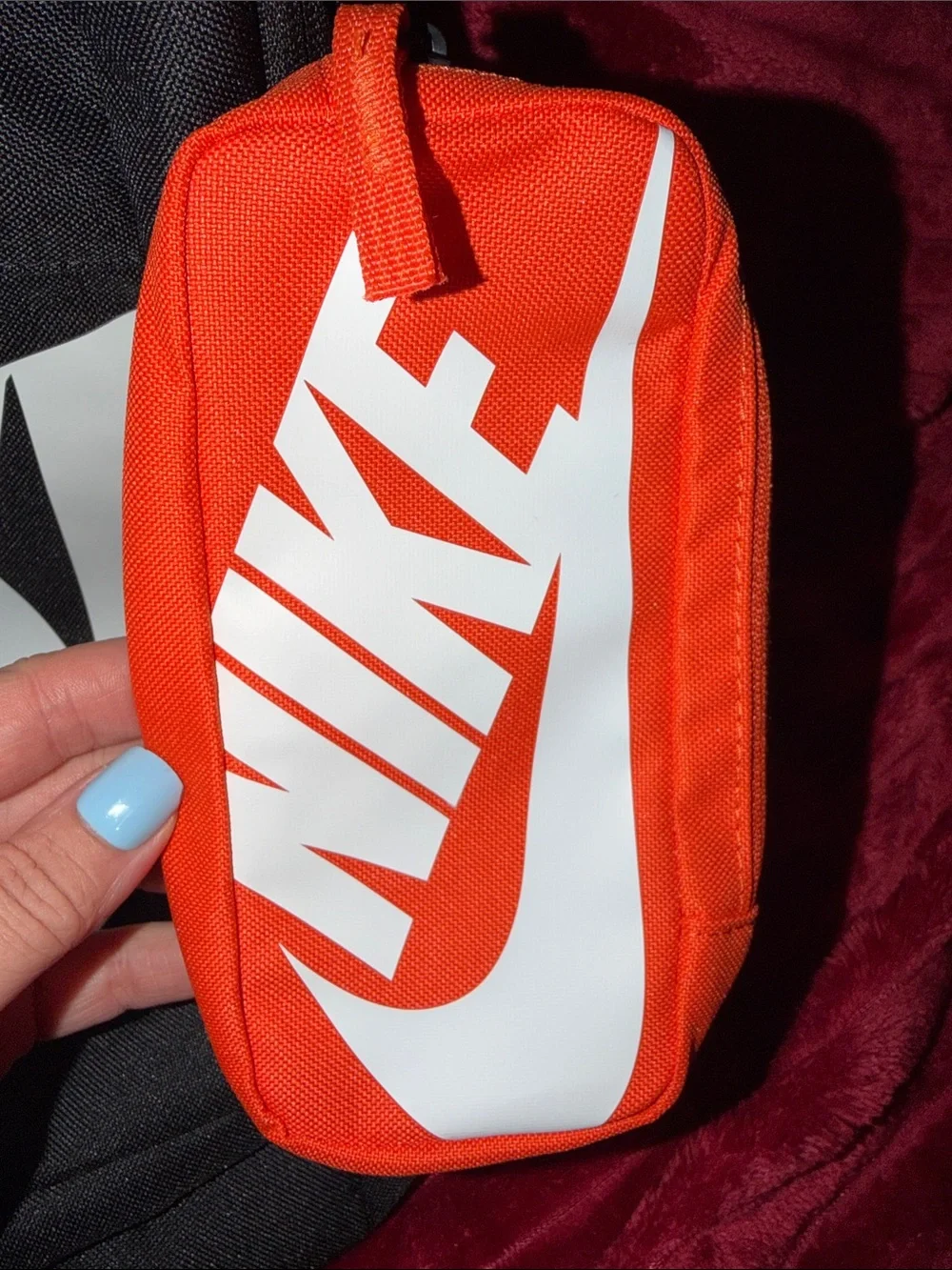 Nike Black Backpack with White Logo and Orange Pouch